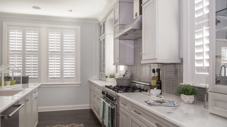 Polywood shutters in Dover kitchen with modern appliances.